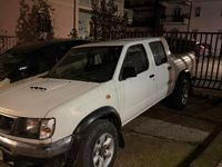 Usata Nissan Navara 103 CV (75 kW) 1999 Bianco Pick-up