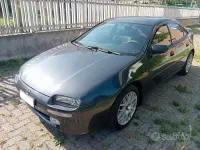 Usata Mazda 323F 144 CV (105 kW) 1998 Grigio Berlina