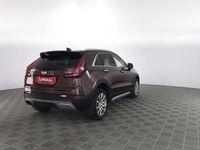 Usata Cadillac XT4 174 CV (127 kW) 2022 Rosewood red SUV