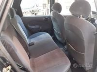 Usata Ford Escort Ghia 88 CV (64 kW) 1997 Nero Berlina