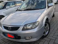 Usata Mazda 323F 101 CV (74 kW) 2003 Argento Berlina