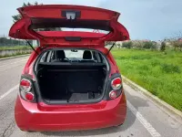 Usata Chevrolet Aveo 75 CV (55 kW) 2013 Arancione Berlina
