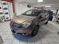 Usata Opel Corsa 85 CV (62 kW) 2011 Marrone Berlina
