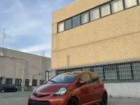 Usata Toyota Aygo Connect Style 68 CV (50 kW) 2013 Arancione Utilitaria