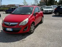 Usata Opel Corsa Club 85 CV (62 kW) 2011 Rosso Utilitaria