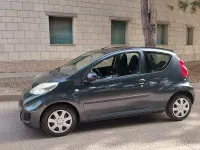Usata Peugeot 107 68 CV (50 kW) 2010 Grigio Utilitaria