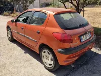 Usata Peugeot 206 75 CV (55 kW) 2001 Arancione Berlina