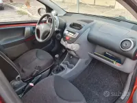 Usata Peugeot 107 54 CV (39 kW) 2010 Arancione Utilitaria