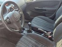 Usata Opel Corsa Edition 95 CV (69 kW) 2010 Argento Utilitaria