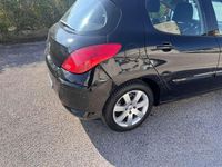 Usata Peugeot 308 Premium 111 CV (81 kW) 2011 Nero Berlina