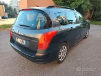 Begagnad Peugeot 308 92 HK (67 kW) 2012 Svart Kombi