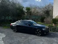 Usata BMW 320 177 CV (130 kW) 2009 Nero Coupé