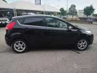 Gebraucht Ford Fiesta Titanium 70 PS (51 kW) 2011 Schwarz Kleinwagen