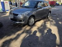 Begagnad Suzuki Swift 75 HK (55 kW) 2011 Grå Halvkombi