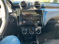 Usata Suzuki Swift 111 CV (81 kW) 2023 Rosso Utilitaria