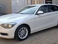Usata BMW 114 102 CV (75 kW) 2014 Bianco perla Utilitaria