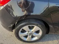Usata Opel Astra 82 CV (60 kW) 2012 Nero Berlina
