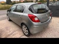 Usata Opel Corsa 45 CV (33 kW) 2012 Grigio Utilitaria