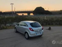 Usata Opel Corsa 65 CV (47 kW) 2010 Grigio Utilitaria