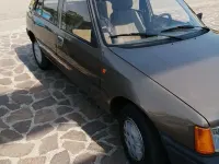 Usata Peugeot 205 49 CV (36 kW) 1984 Bronzo Utilitaria