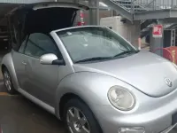 Usata VW New Beetle 101 CV (74 kW) 2004 Argento Utilitaria