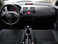 Usata Suzuki Swift 93 CV (68 kW) 2005 Rosso / pastello Utilitaria