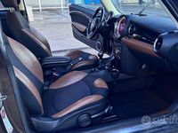 Käytetty Mini Cooper D 112 HP (82 kW) 2012 Ruskea Viistoperä