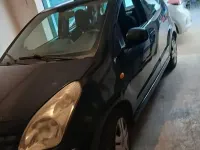 Usata Nissan Pixo 68 CV (50 kW) 2012 Nero Utilitaria