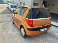 Usata Peugeot 1007 73 CV (53 kW) 2005 Arancione Monovolume