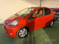Usata Toyota Aygo 68 CV (50 kW) 2012 Arancione Utilitaria