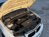 Usata BMW 116 122 CV (89 kW) 2009 Bianco Utilitaria