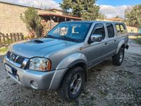 Usata Nissan Navara 133 CV (97 kW) 2004 Grigio Pick-up