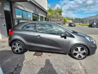 Usado Kia Rio 90 HP (66 kW) 2012 Cinzento Sedan