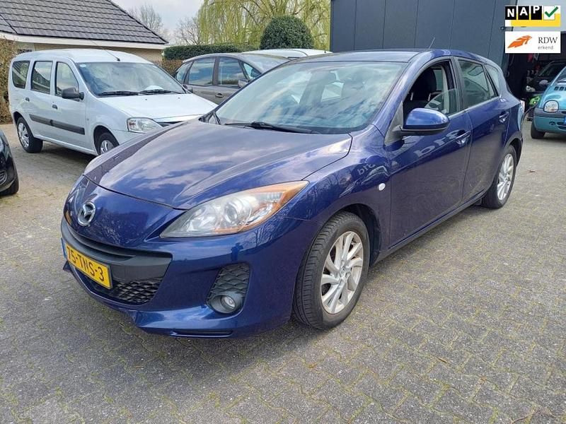 Blauw (metallic) Gebruikt 2012 Mazda 3 Hatchback | € 2.950 - Afbeelding 1/4