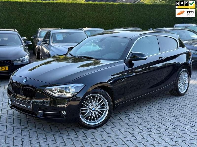 Zwart Gebruikt 2013 BMW 116 Sport Line Hatchback | € 9.950 (Iets duurder) - Afbeelding 1/4