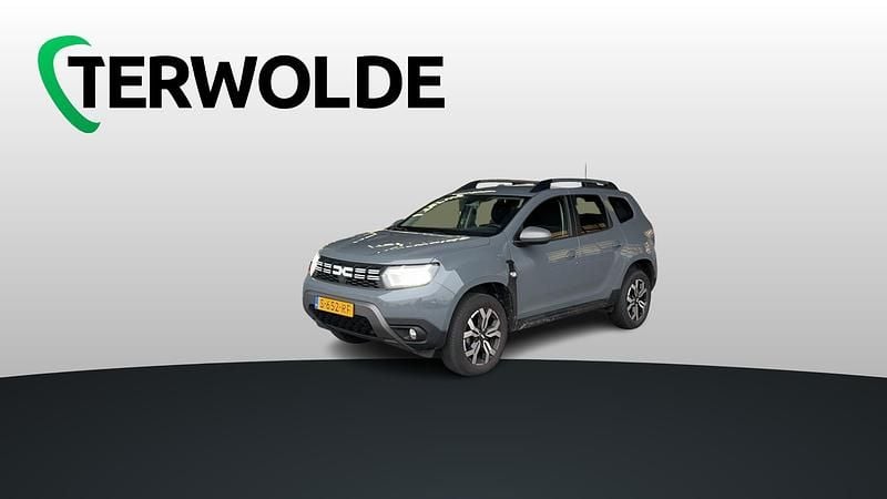Grijs Gebruikt 2023 Dacia Duster Journey SUV | € 21.840 - Afbeelding 1/4