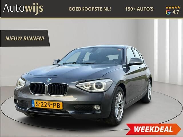 Grijs Gebruikt 2014 BMW 116 Urban Line Hatchback | € 10.395 (Eerlijke prijs) - Afbeelding 1/4