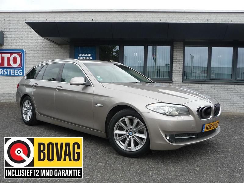 Beige Gebruikt 2012 BMW 530 Executive Stationwagen | € 18.950 - Afbeelding 1/4