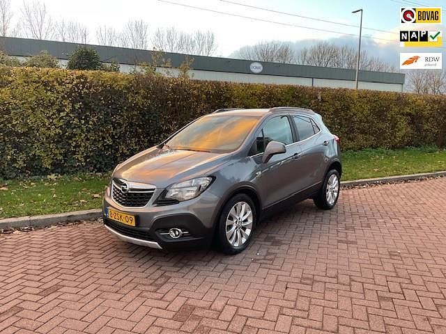 Grijs Gebruikt 2015 Opel Mokka Cosmo SUV | € 9.950 (Eerlijke prijs) - Afbeelding 1/4
