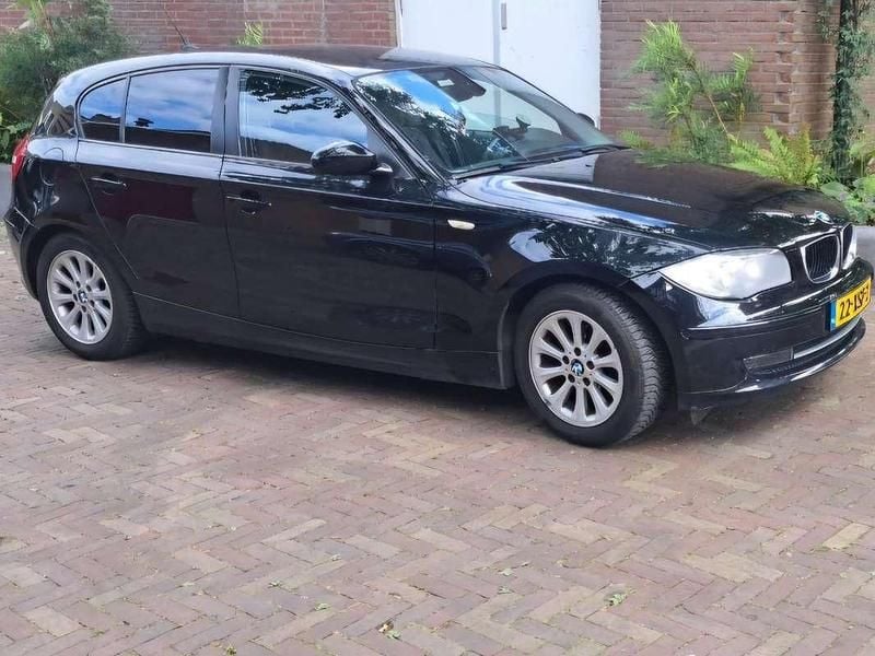 Zwart Gebruikt 2009 BMW 116 Hatchback | € 3.500 - Afbeelding 1/4