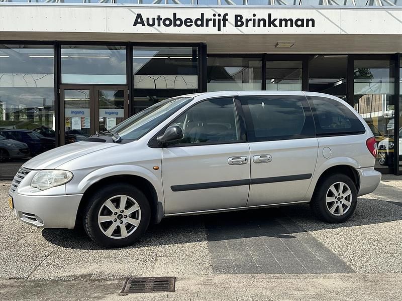 Grijs Gebruikt 2005 Chrysler Voyager MPV | € 1.750 (Duur) - Afbeelding 1/4