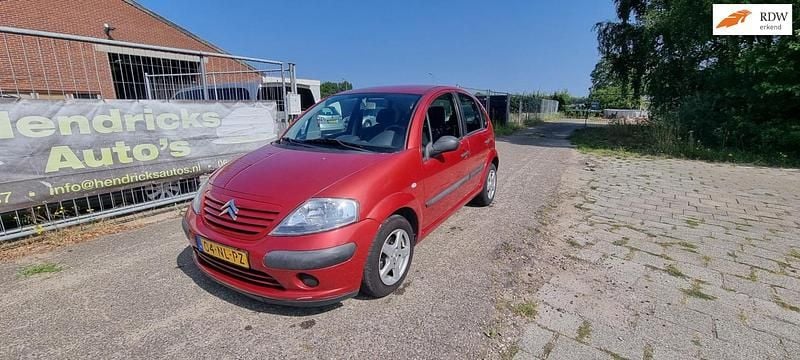 Rood (metallic) Gebruikt 2003 Citroën C3 Hatchback | € 1.250 (Eerlijke prijs) - Afbeelding 1/4