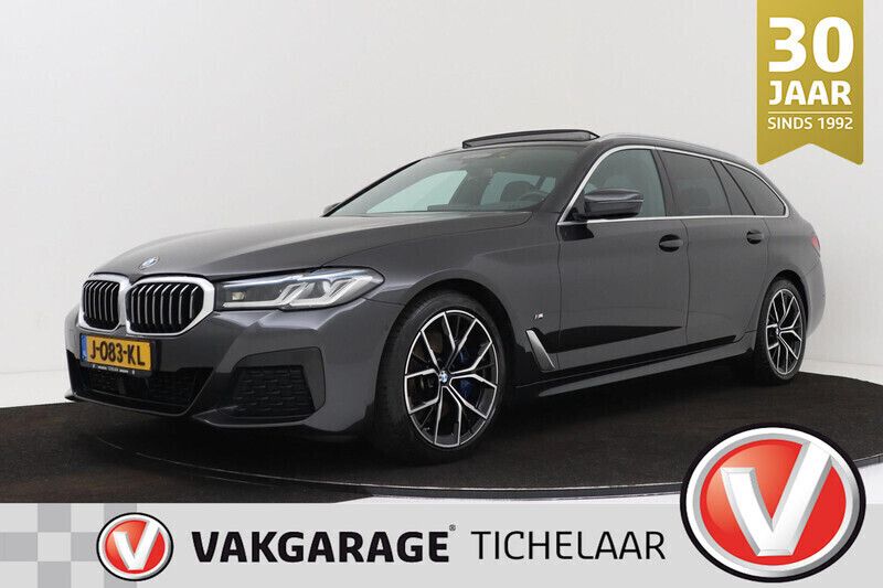 Grijs Gebruikt 2020 BMW 530 Executive Stationwagen | € 39.899 (Eerlijke prijs) - Afbeelding 1/4