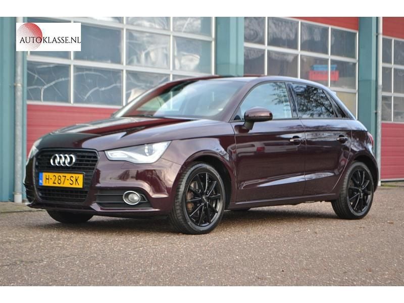 Paars Gebruikt 2012 Audi A1 Ambition Hatchback | € 9.695 (Eerlijke prijs) - Afbeelding 1/4