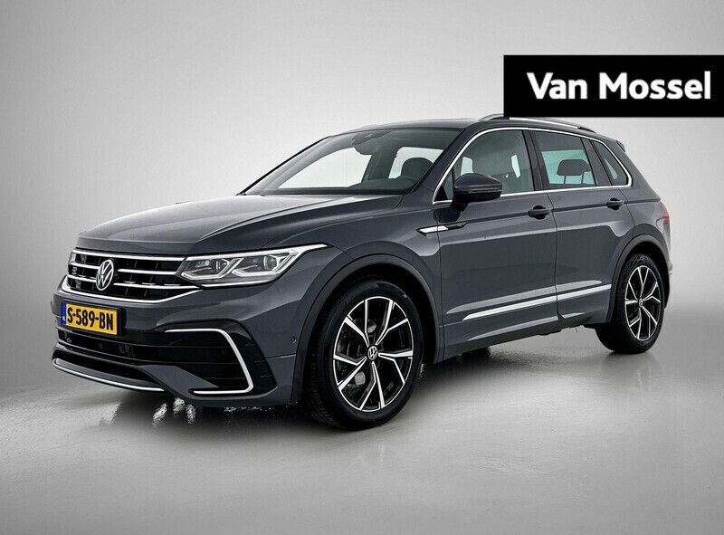 Grijs Gebruikt 2022 VW Tiguan R-line SUV | € 39.400 (Eerlijke prijs) - Afbeelding 1/4