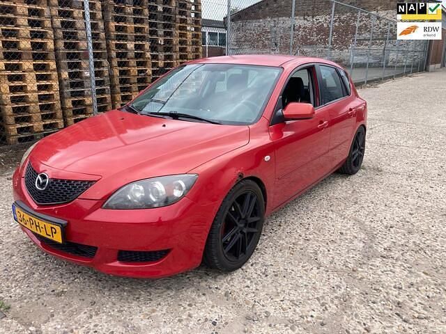 Rood Gebruikt 2004 Mazda 3 Inclusive Hatchback | € 1.999 (Goede deal) - Afbeelding 1/4