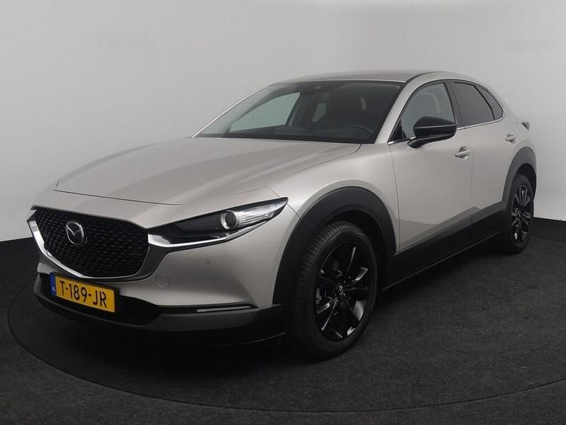Platinum quartz (metallic) Gebruikt 2023 Mazda CX-30 Homura-Line SUV | € 27.950 (Eerlijke prijs) - Afbeelding 1/4