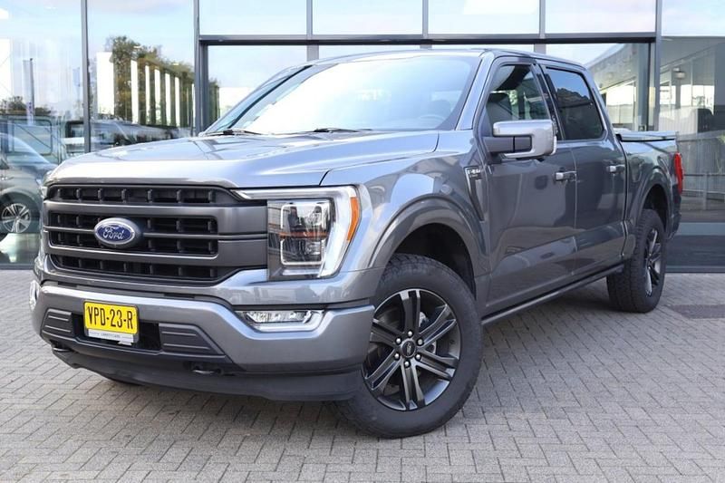 Grijs (metallic) Gebruikt 2022 Ford V8 Lariat Cabriolet | € 57.950 - Afbeelding 1/4
