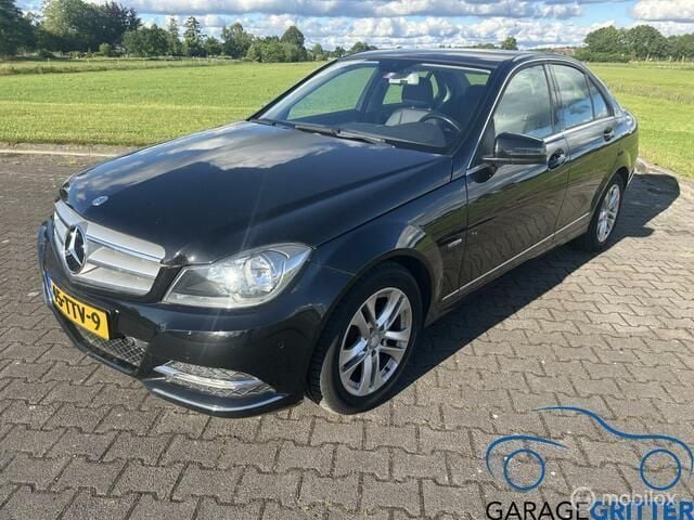 Zwart Gebruikt 2012 Mercedes C180 Avantgarde Sedan | € 9.999 (Eerlijke prijs) - Afbeelding 1/4