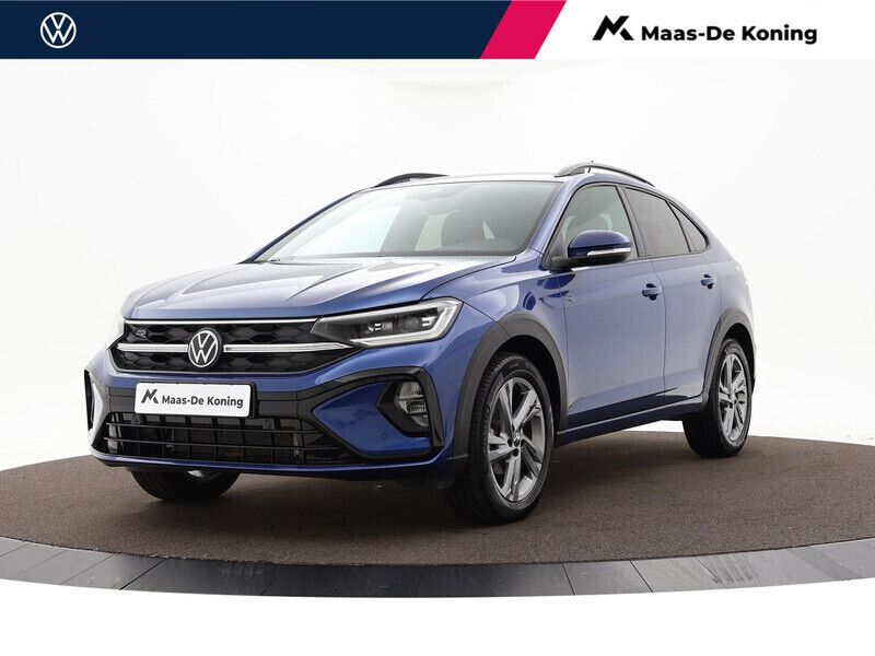 Blauw Gebruikt 2024 VW Taigo Business SUV | € 26.740 - Afbeelding 1/3